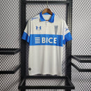 Camisa Universidade Católica Home 23/24 - Torcedor Under Armour Masculina - Branco