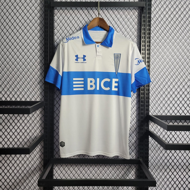 Camisa Universidade Católica Home 23/24 - Torcedor Under Armour Masculina - Branco