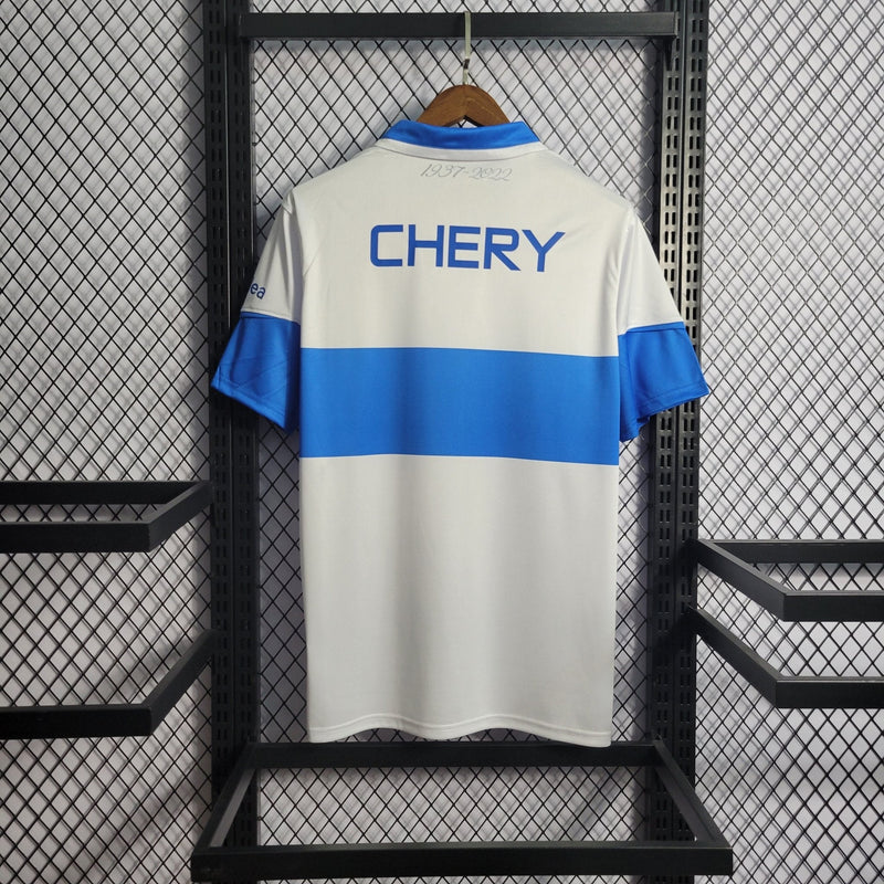 Camisa Universidade Católica Home 23/24 - Torcedor Under Armour Masculina - Branco